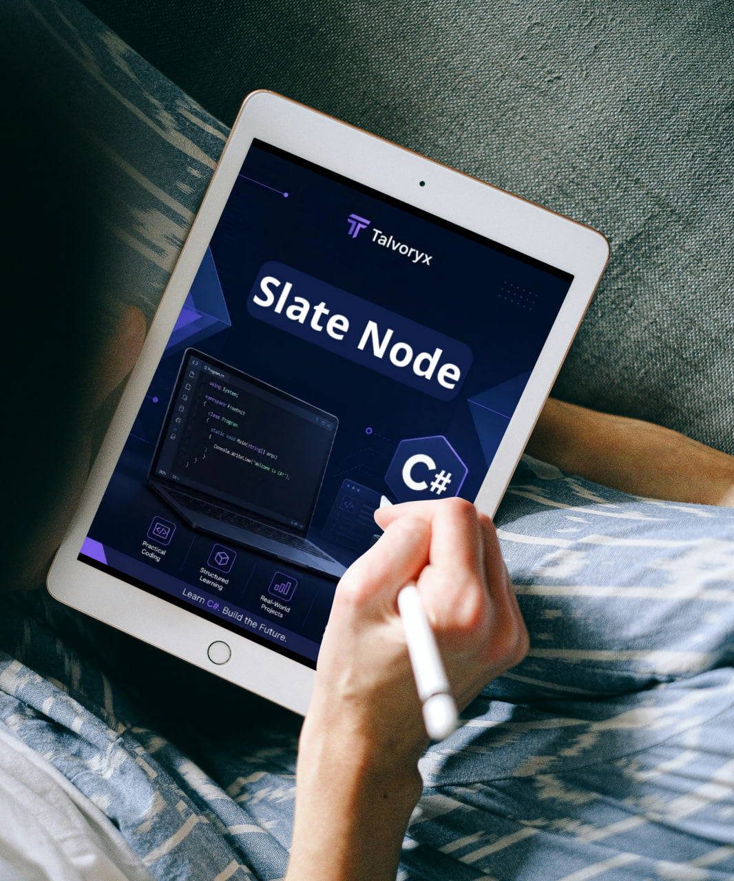 Person holding a tablet displaying the Talvyry Slate Node app on a bed.